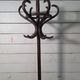 Curved antique wooden parrot
