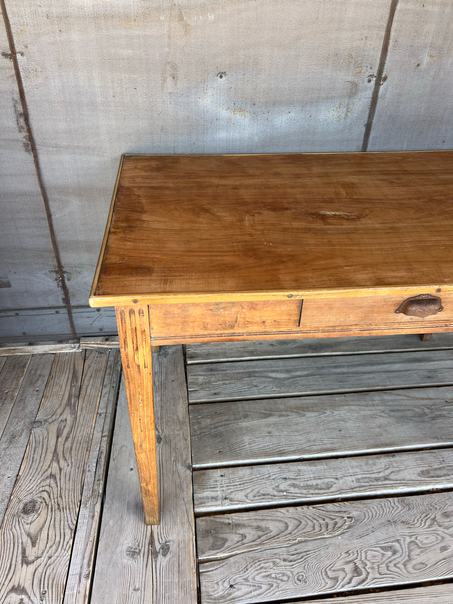 Old raw wood table with extension
