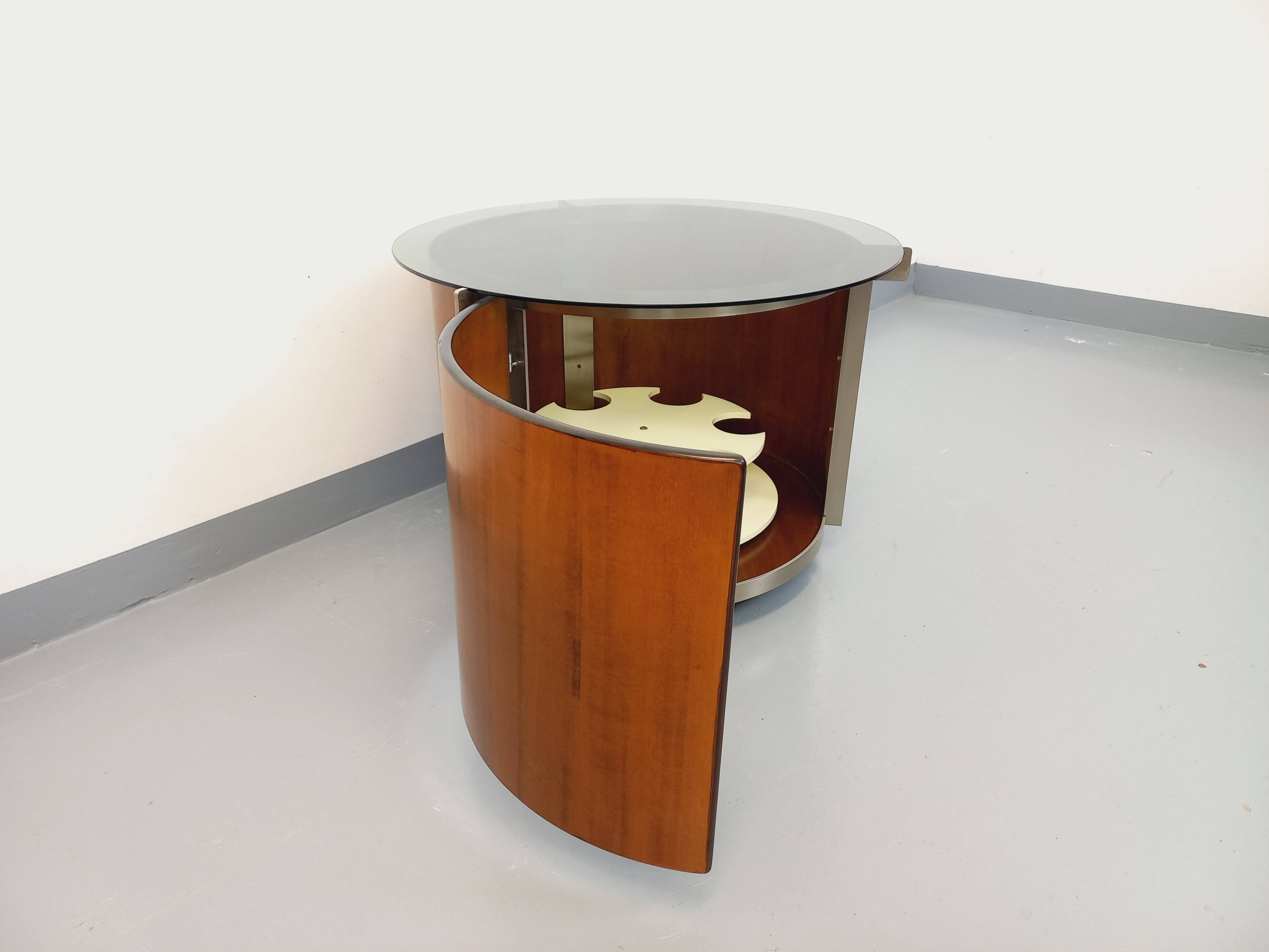 Round Italian teak coffee table swivel bar by Eugenio Gerli for Tecno