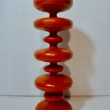 Vintage wooden candlestick turned orange
