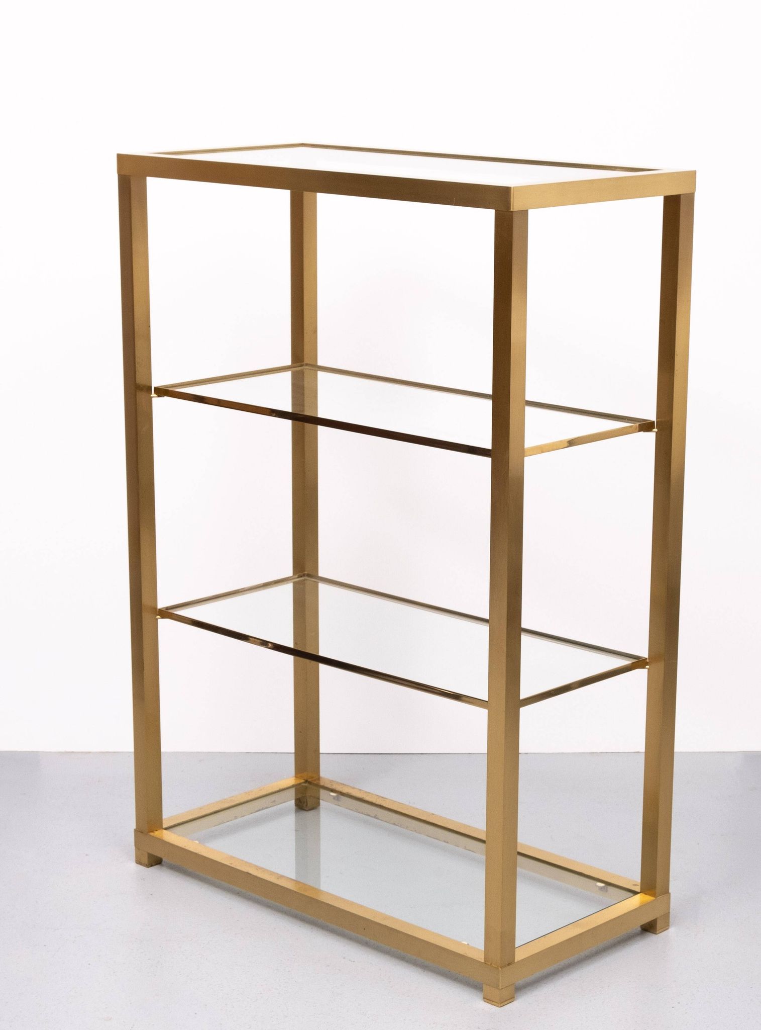 Brass and Glass Etagere or bookcase . Italy 1970s