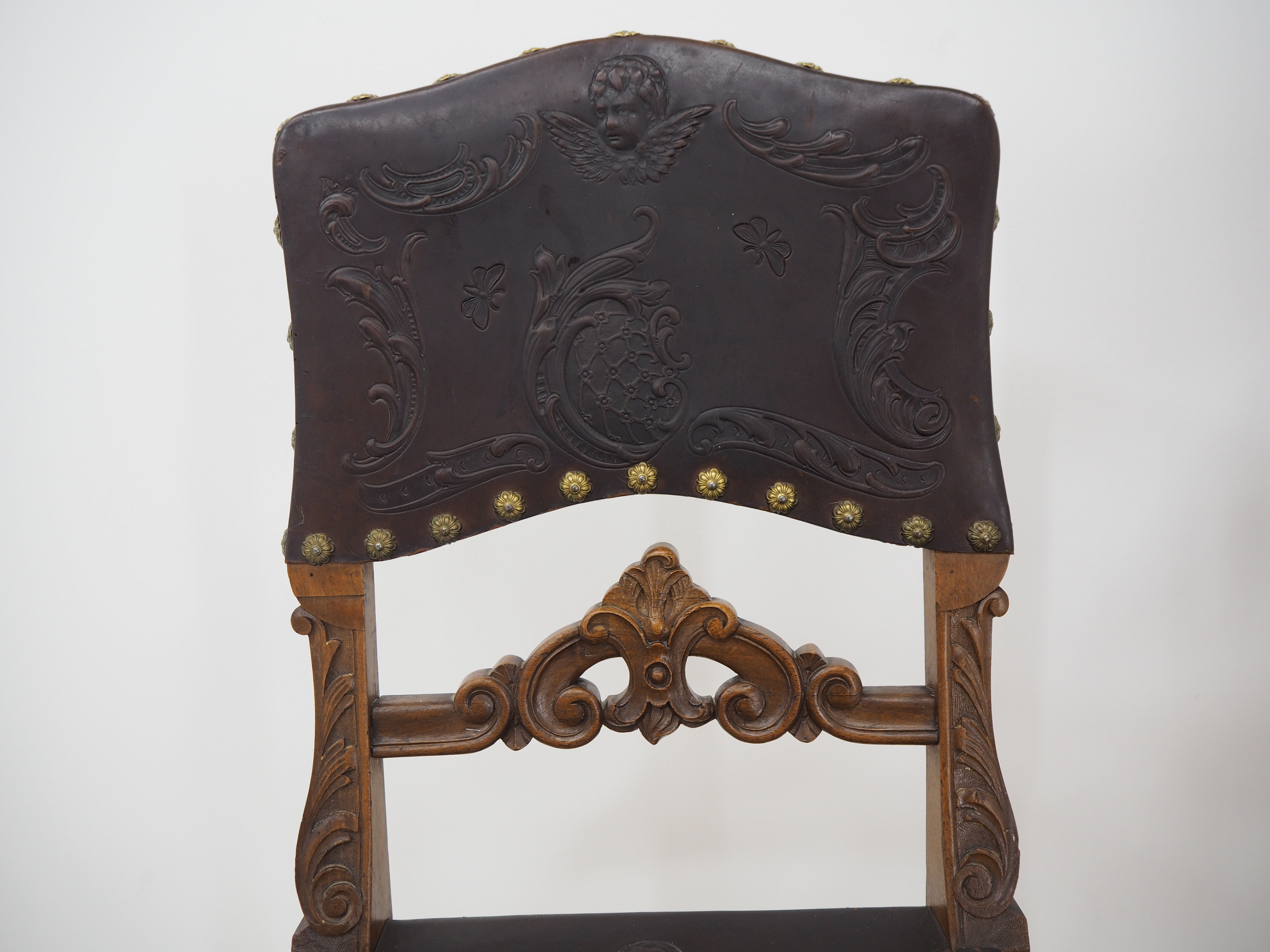 Pair of Antique Embossed Leather Chairs
