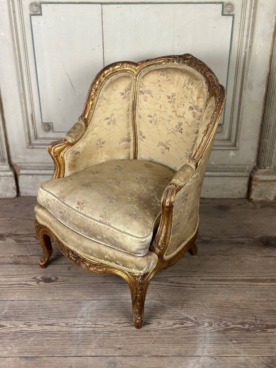 A Louis XV style child's bergère chair in carved and gilded wood, circa 1880
