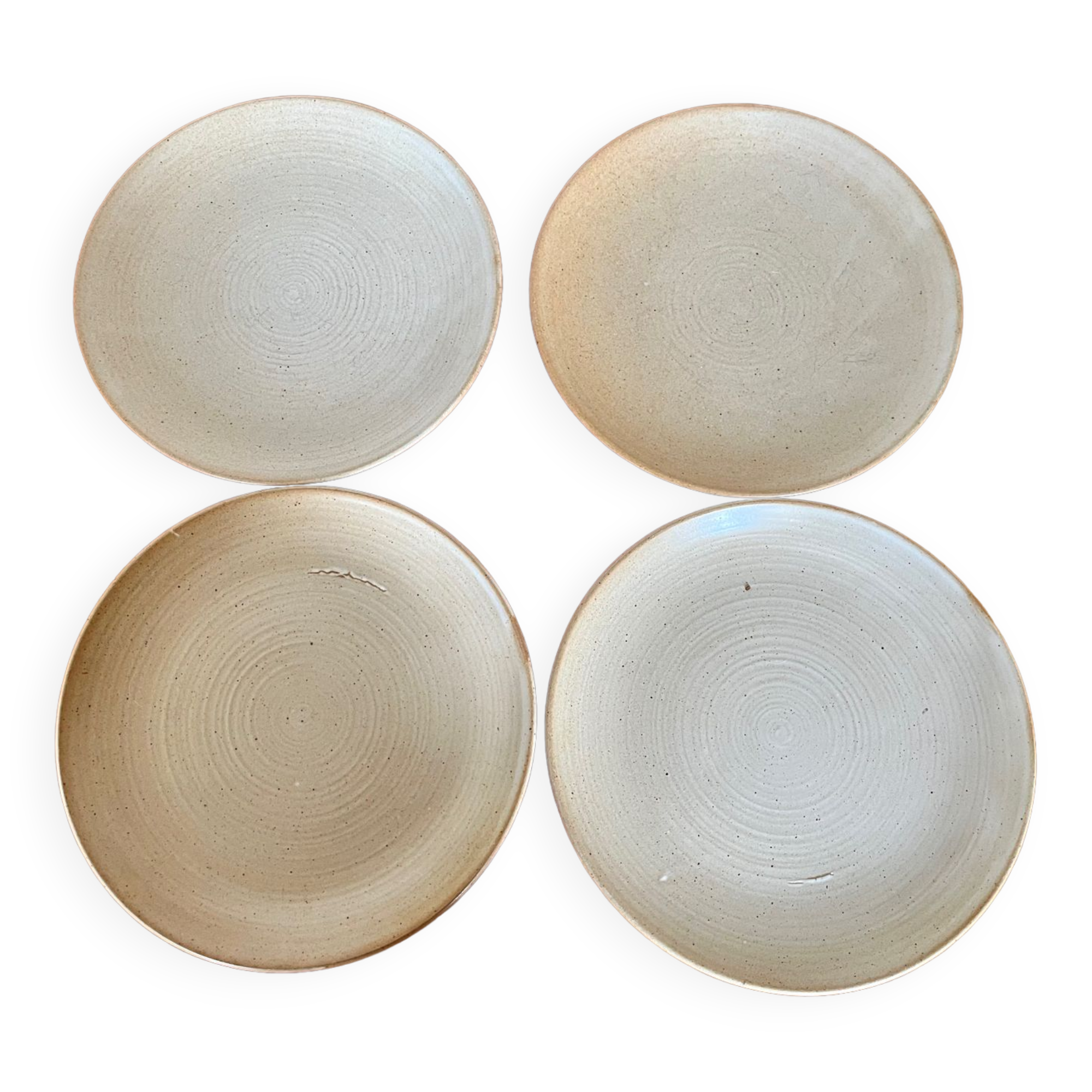 Lot de quatre assiettes plates en grès CNP Village vintage