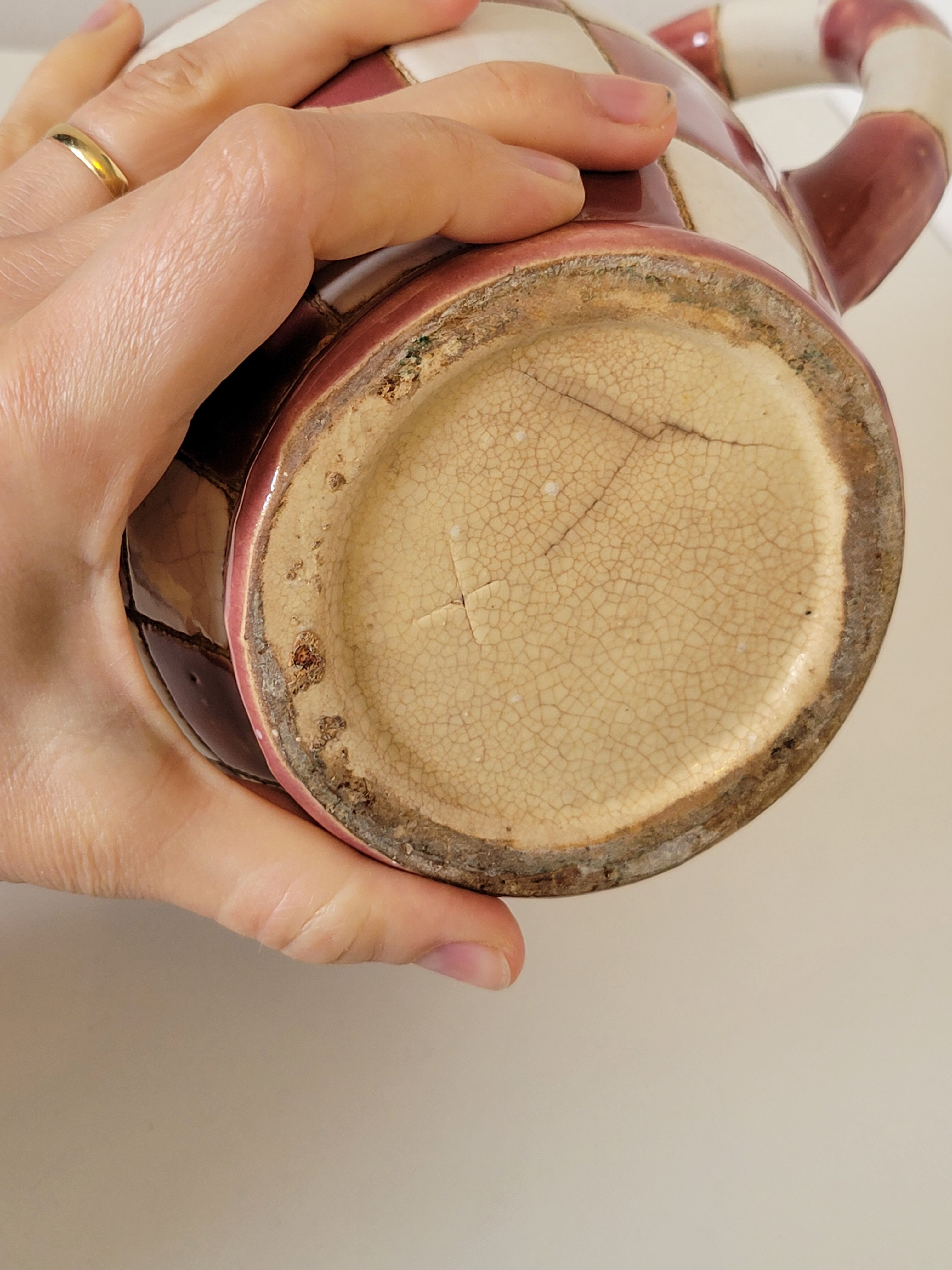 Old ceramic pitcher pattern checkerboard tiles