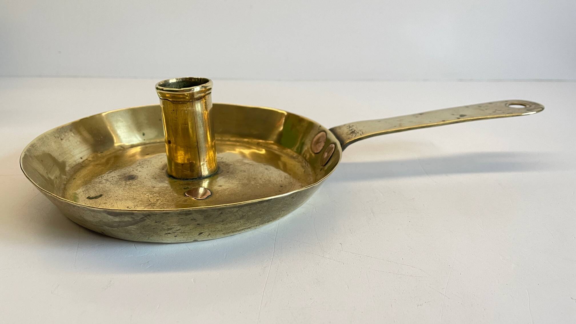 LOW HAND BRASS CANDLESTICK ANTIQUE