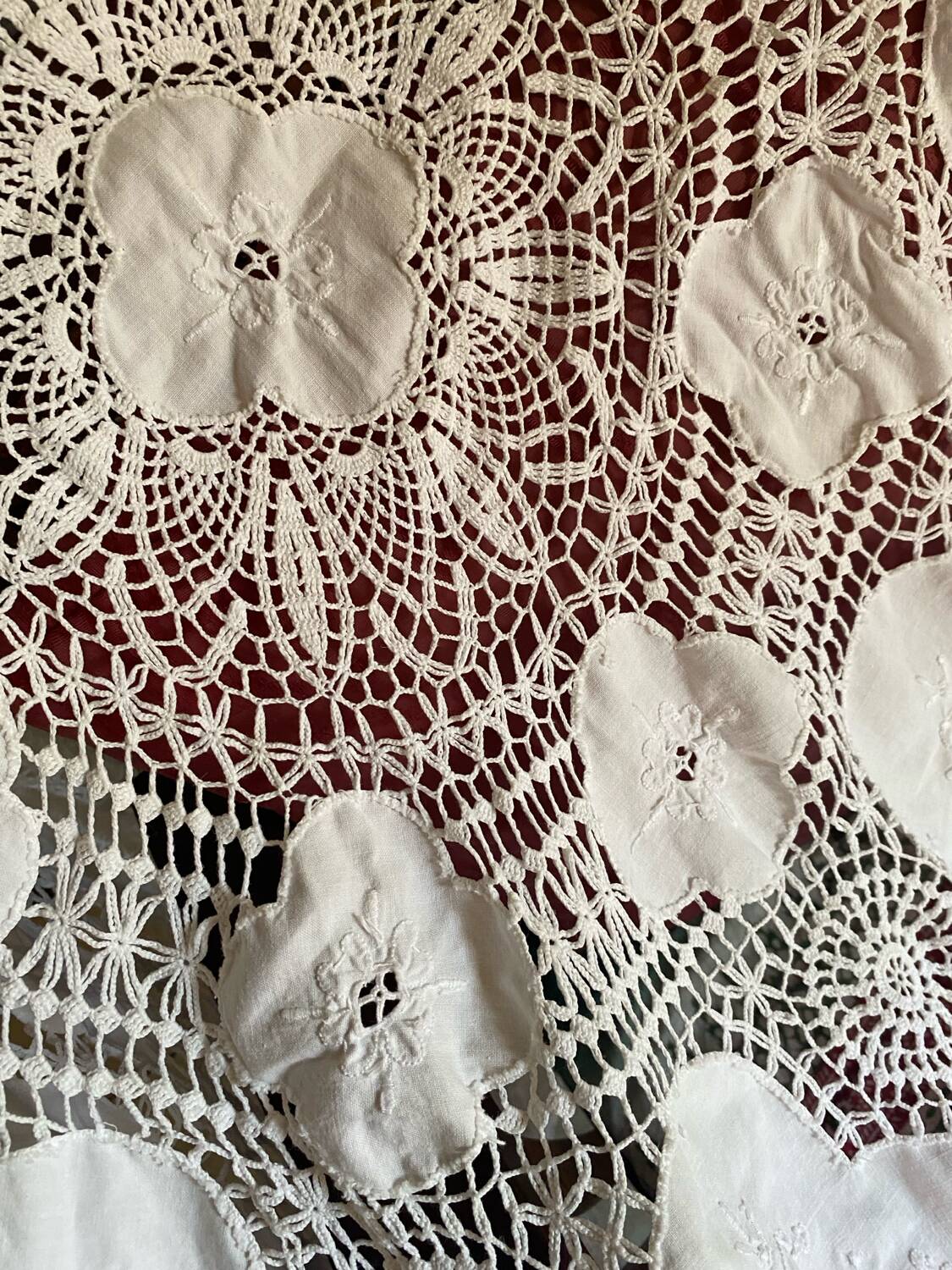 White cotton tablecloth with crochet lace.