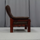 Pair of armchairs and ottoman in leather, 1970