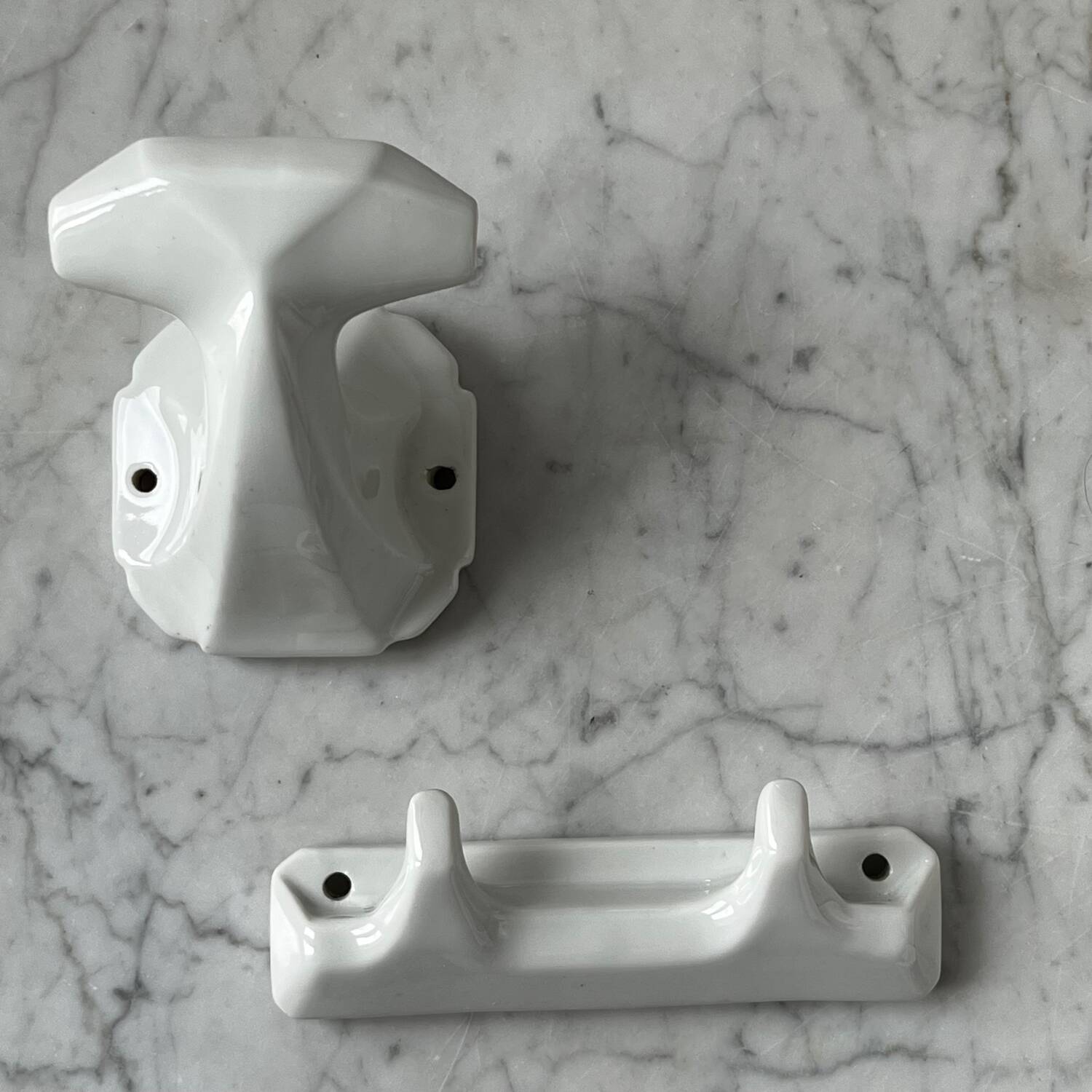 White porcelain coat hooks