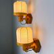 Pair of articulated "Cocoon" wall lights, resin and pine, Italy, circa 1970