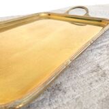 Old serving tray in gilded brass
