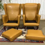 Pair of 1980s English wingback armchairs in leather.