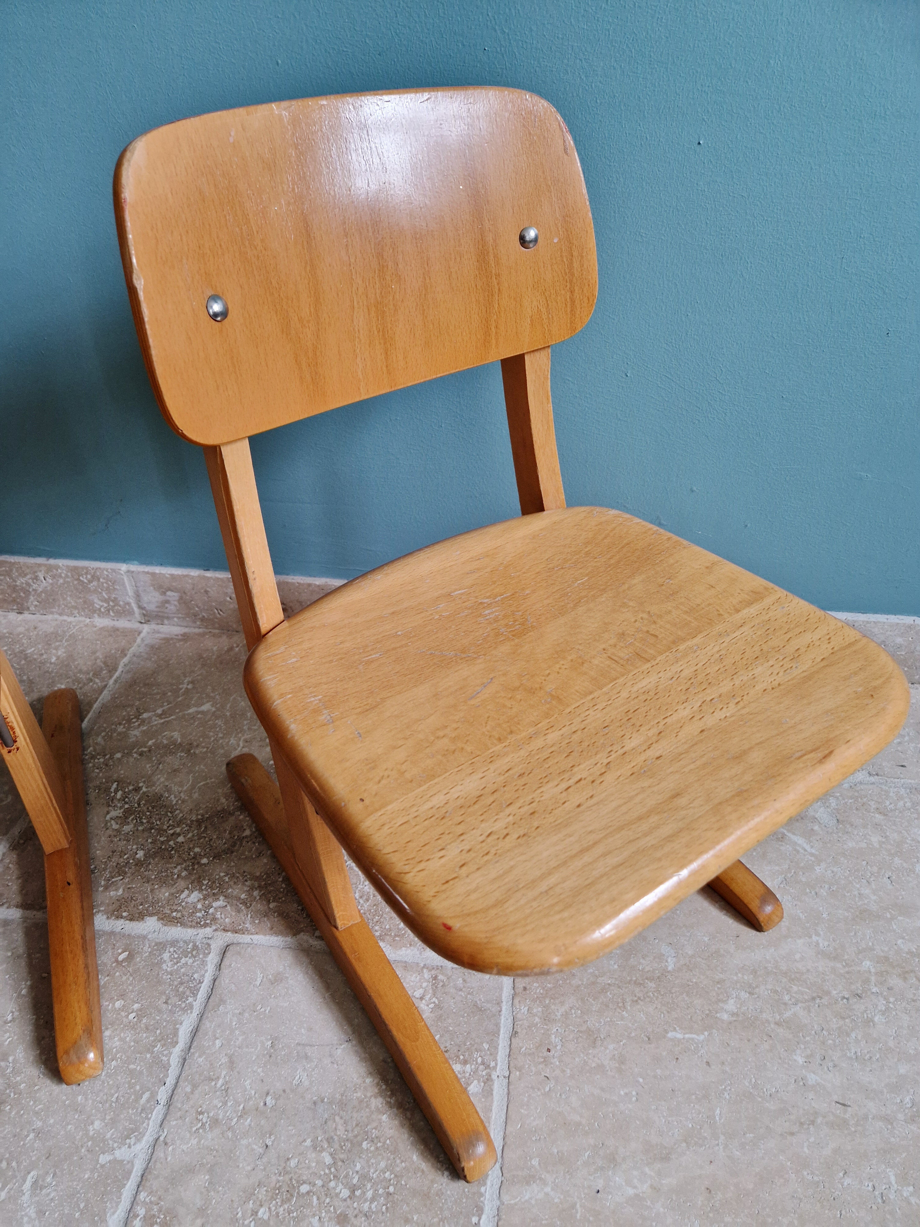 Pair of children's chairs by Casala in solid beech, 1960s.