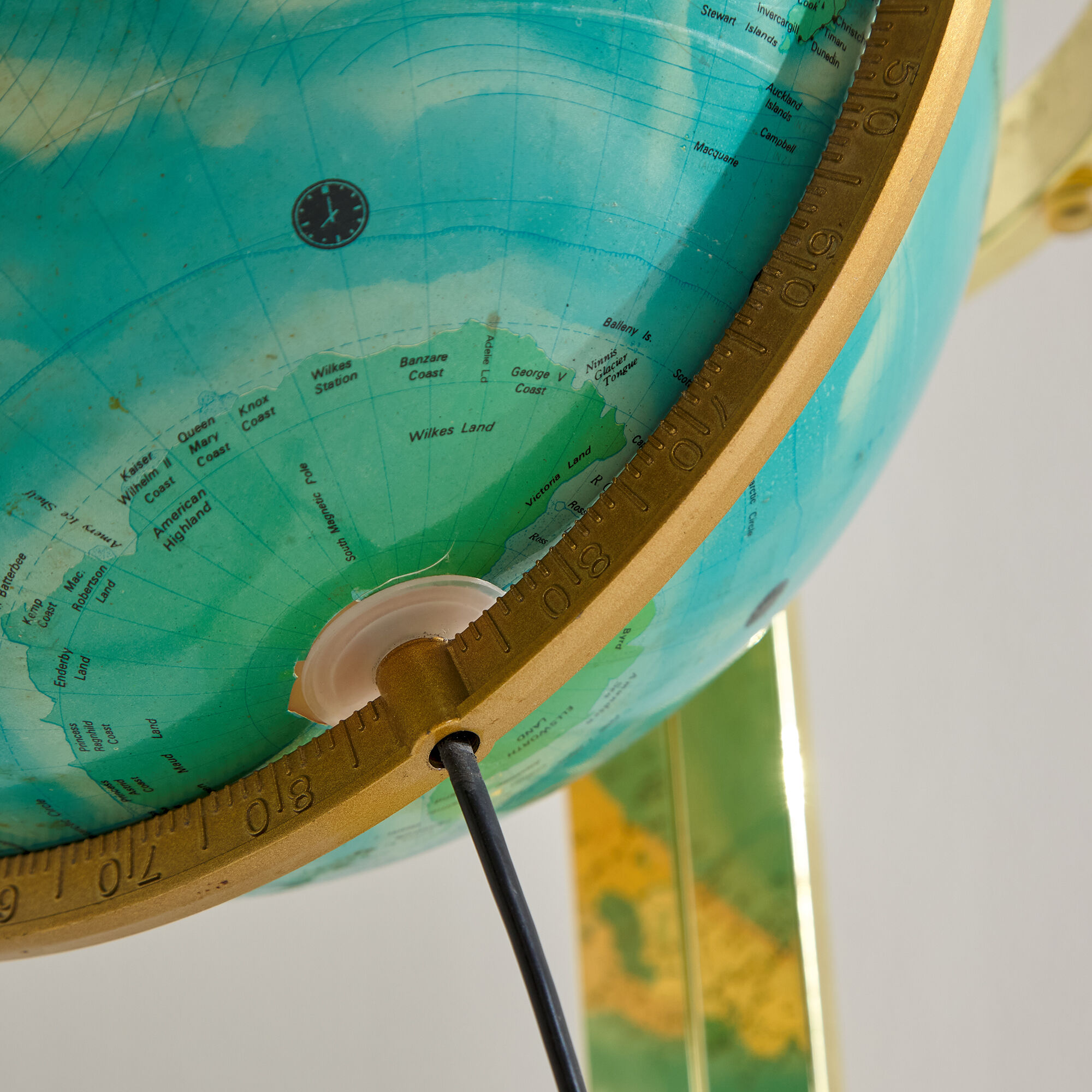 Illuminated globe on brass frame, 1980s