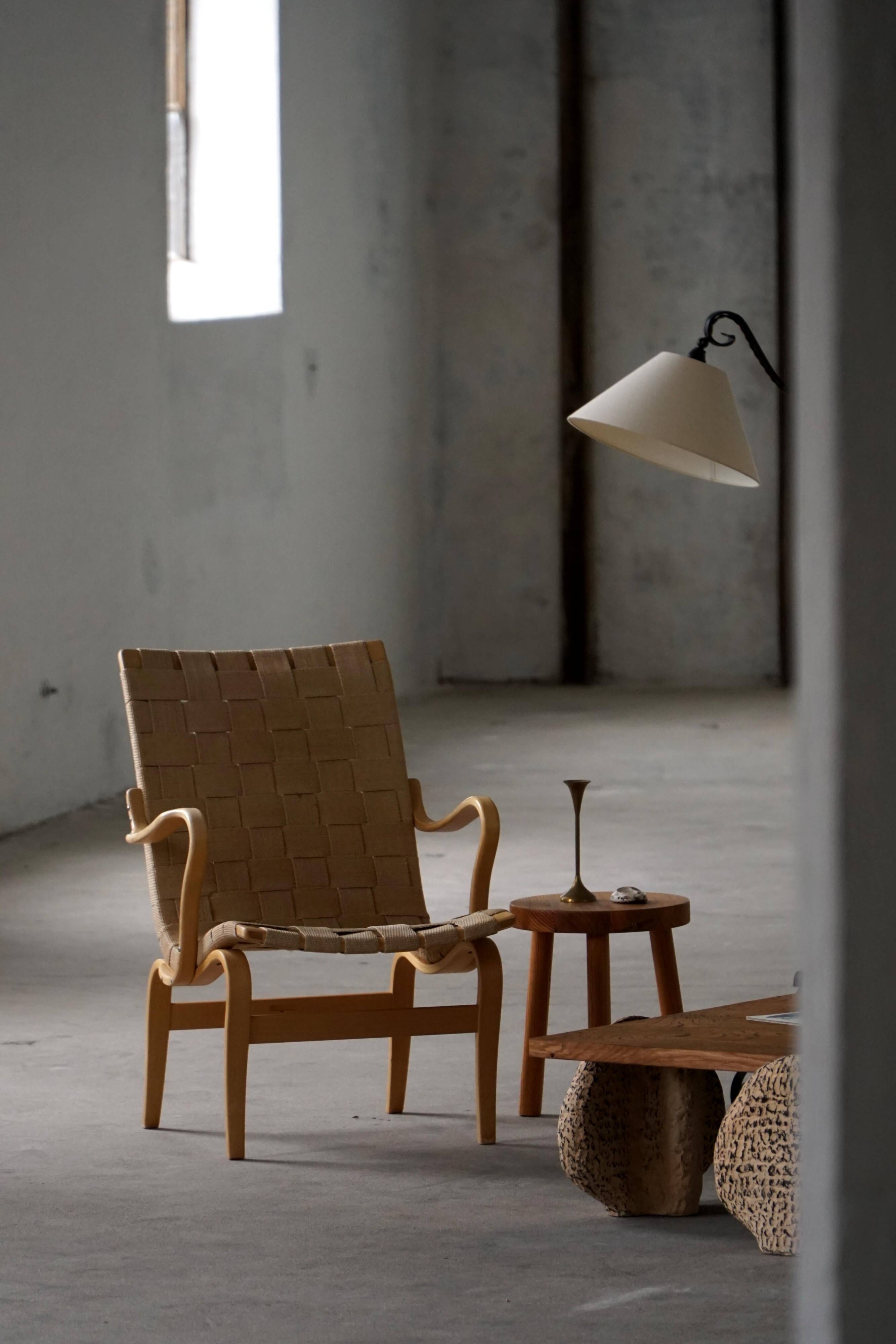 Pair of Swedish armchairs from the mid-century by Bruno Mathsson, model "Eva", 1960s.