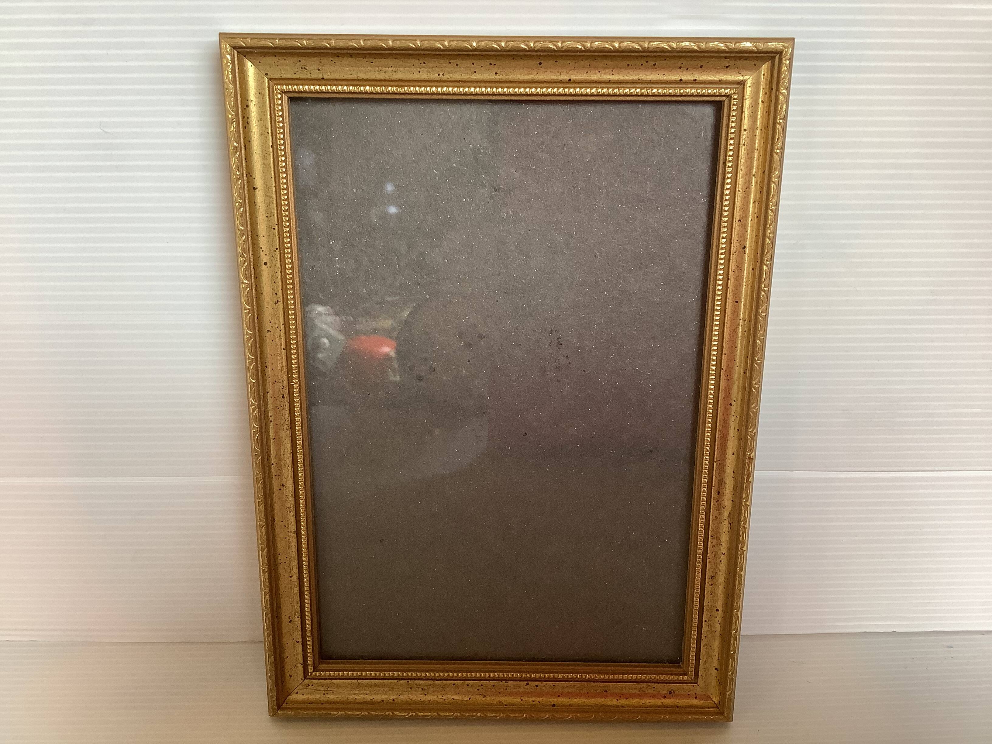 Four gilded wood frames to place or hang