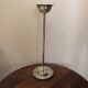 Silver-plated metal candlestick in vintage Art Deco style