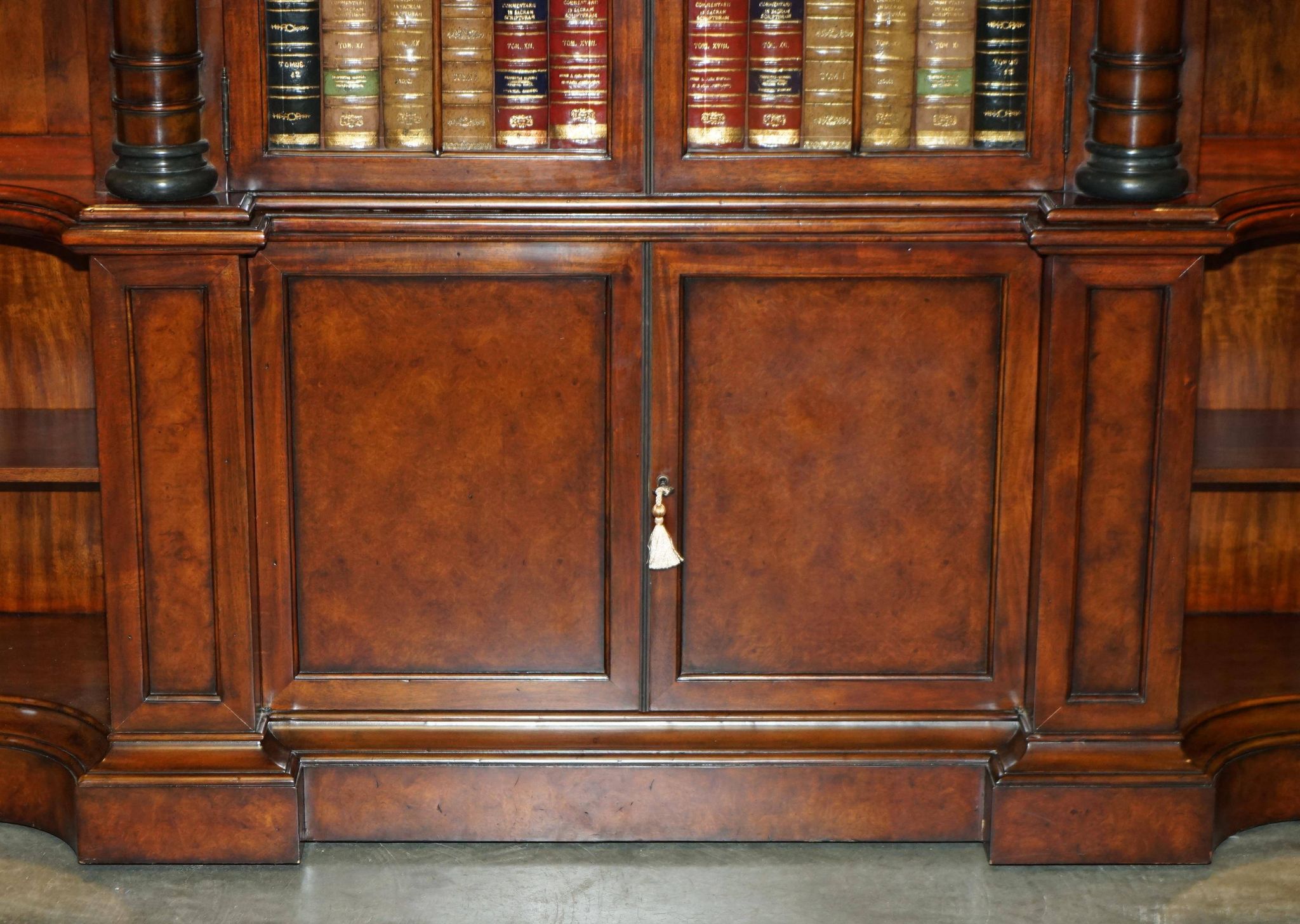 Theodore Alexander library in faux books in burl laurel.