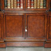 Theodore Alexander library in faux books in burl laurel.