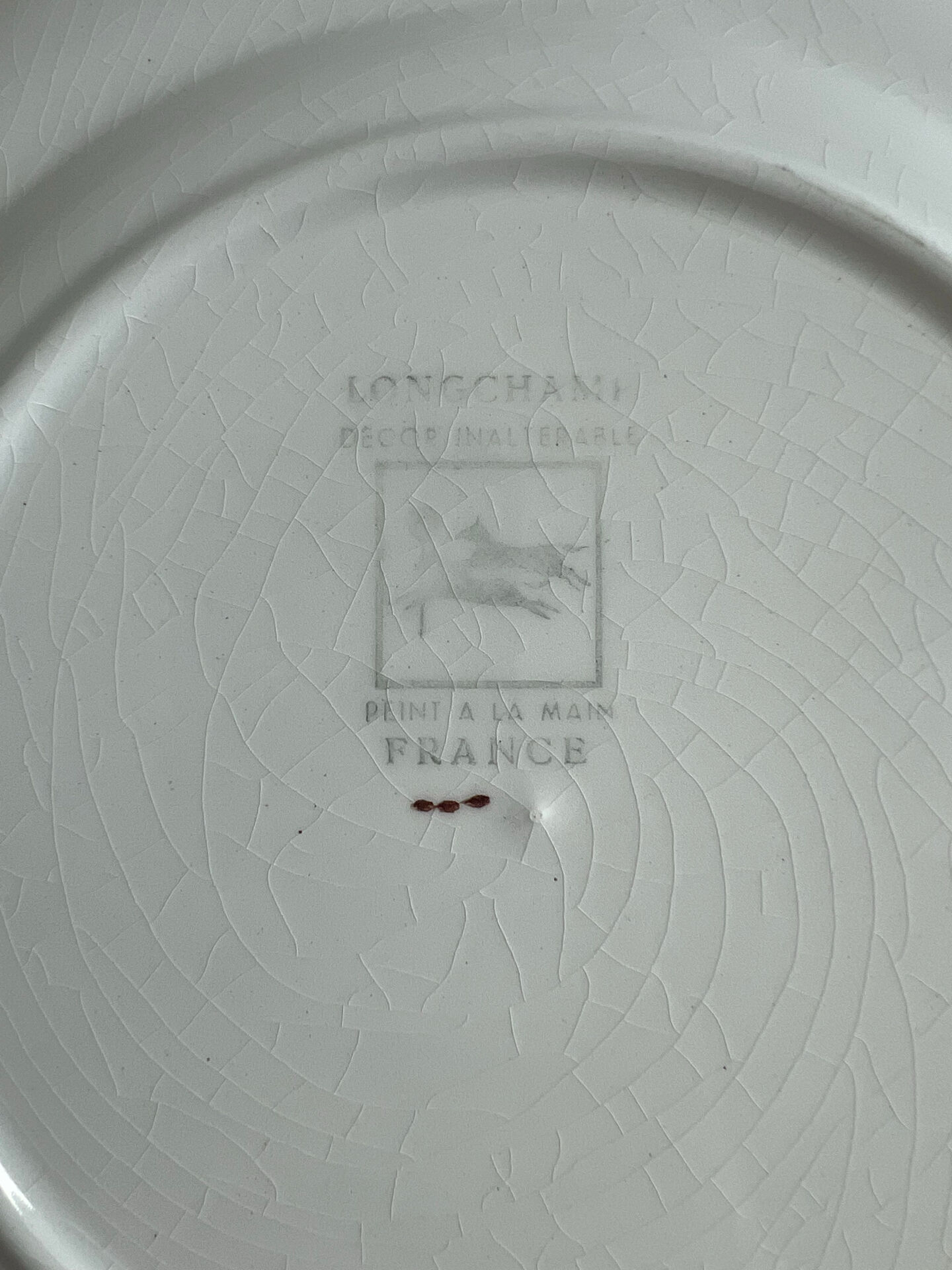 Longchamp hand-painted. Set of 2 flat plates.
