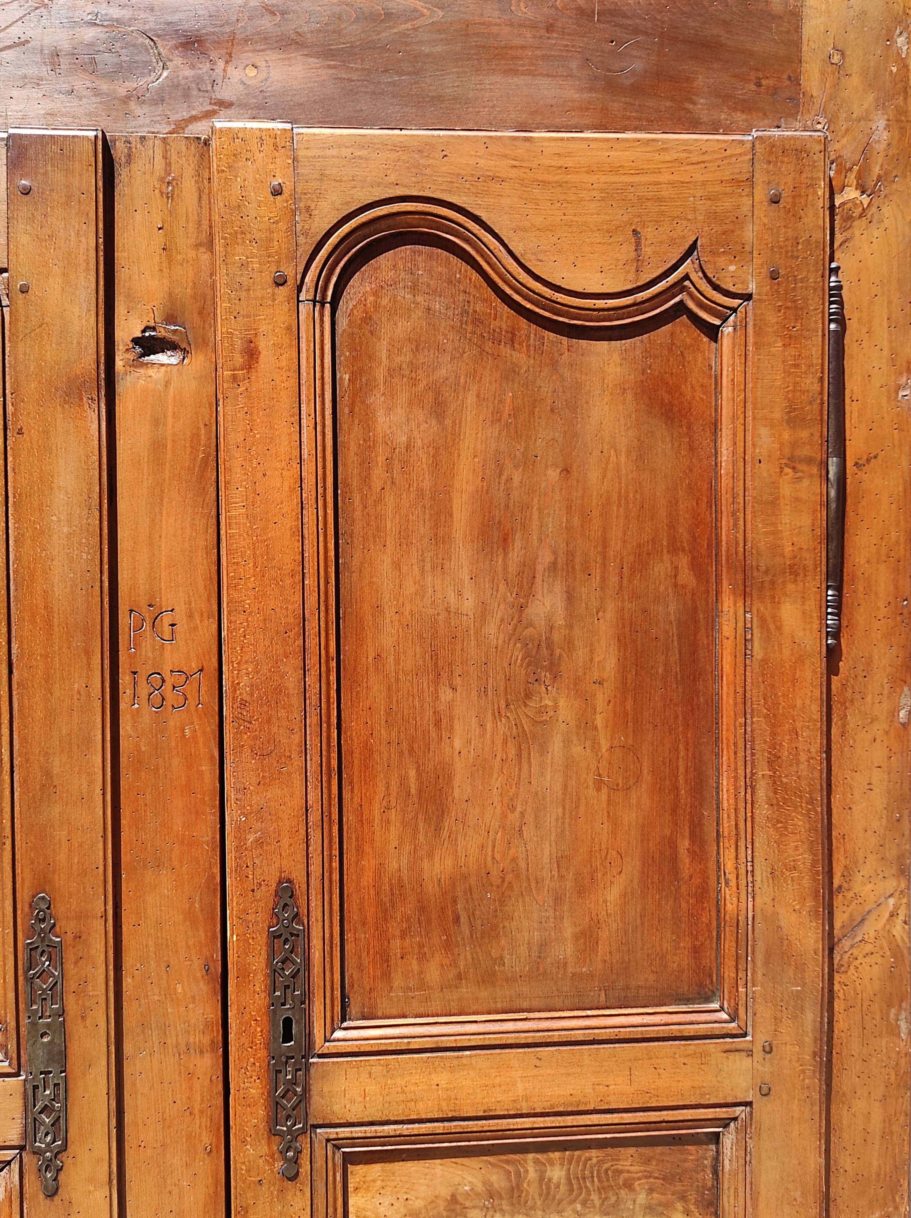 Old rustic oak cabinet of the 19th century louis 15 style
