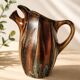 Vintage Belgian ceramic sculptural pitcher in chocolate brown.