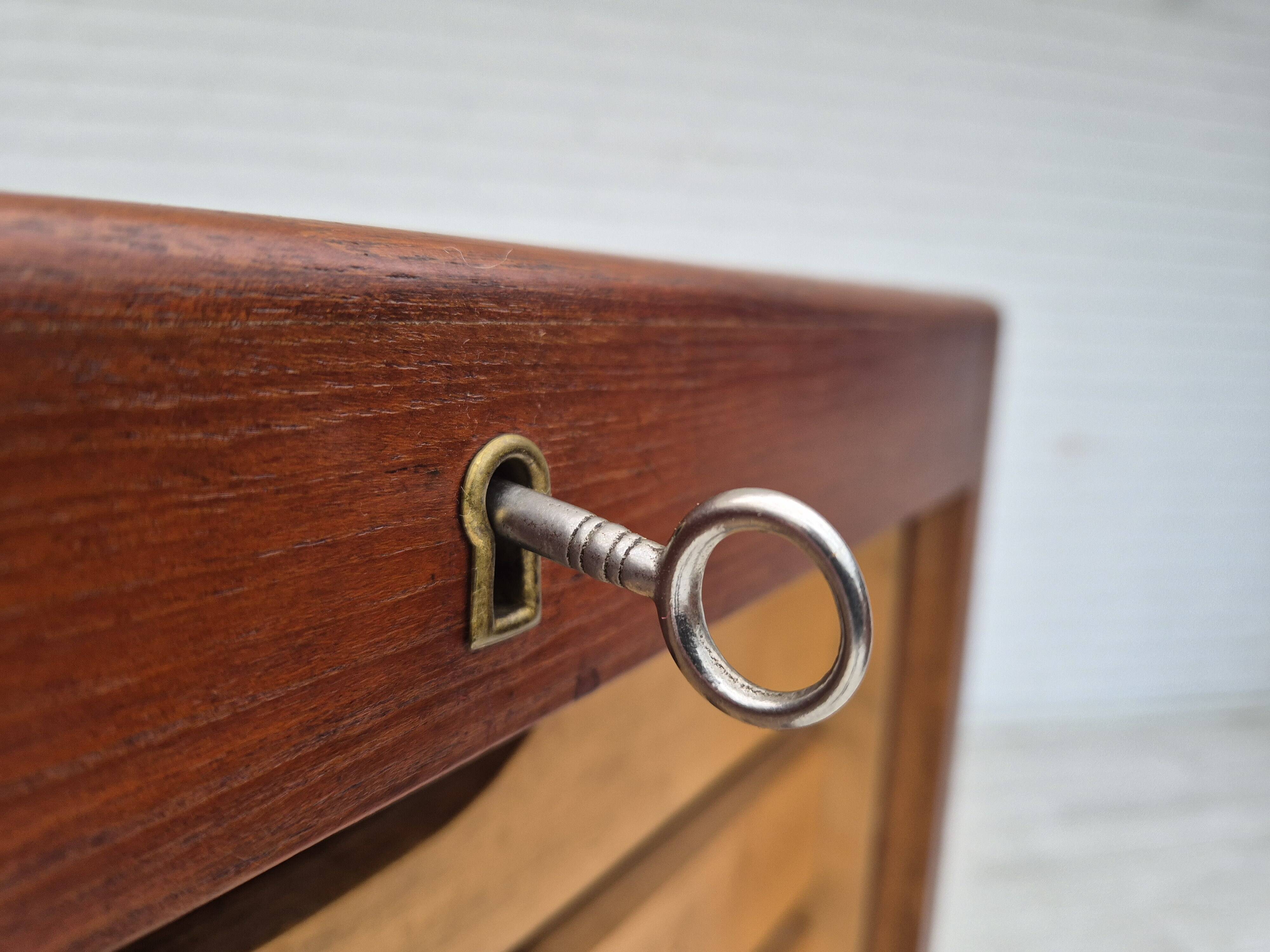1960s, Danish office cabinet, original condition, teak wood, sliding doors, drawers inside.