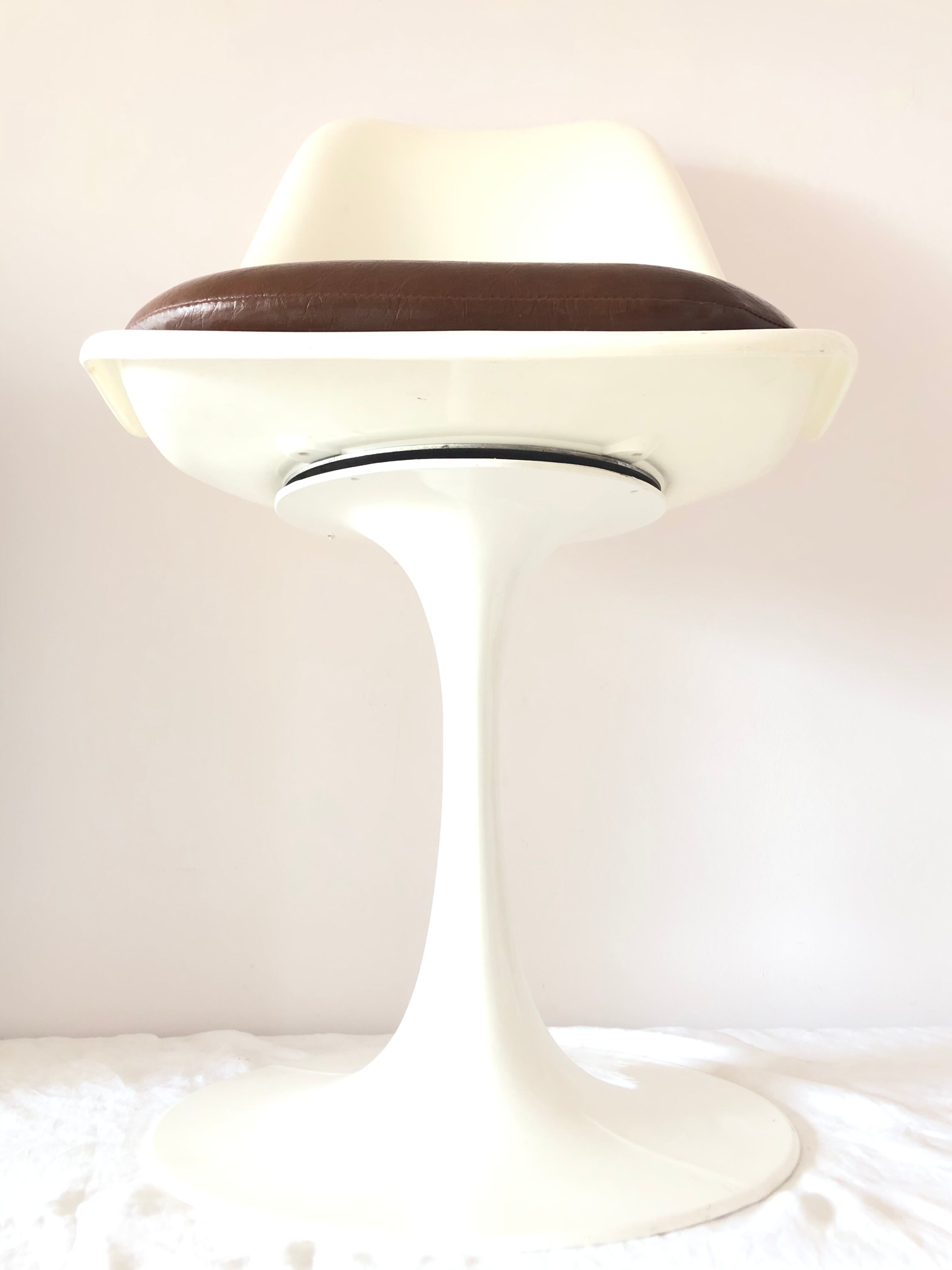 Pair of vintage tulip foot swivel chairs