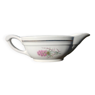 Porcelain gravy boat from the Orchies Moulin des Loups earthenware factory with lilac decoration