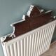 Old pediment in painted wood