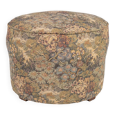 Upholstered pouf in verdure tapestry style, France, late 19th century.