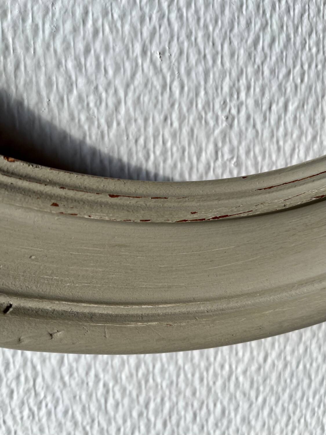 Oval frame in weathered wood