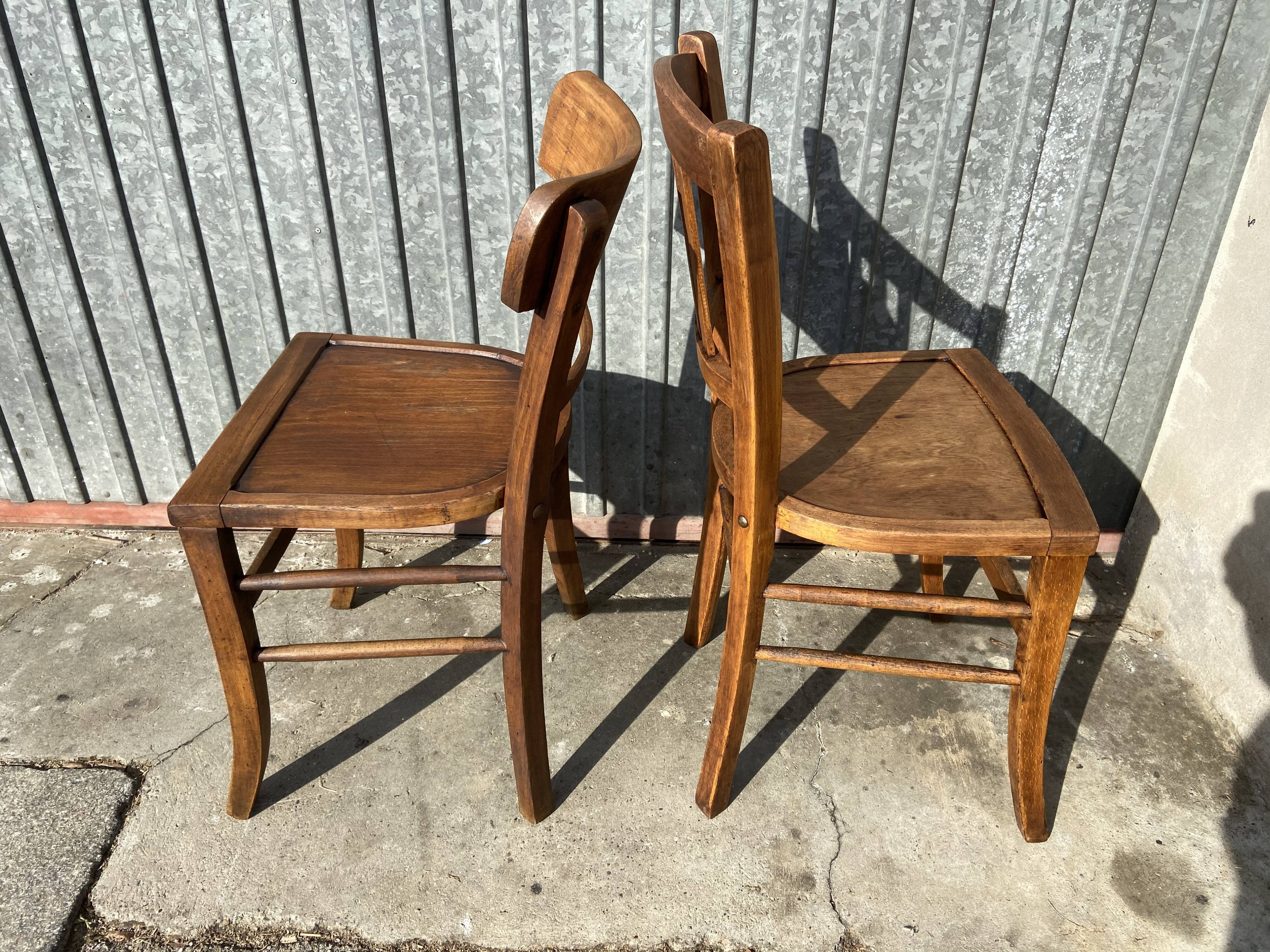 Pair of mismatched bistro chair