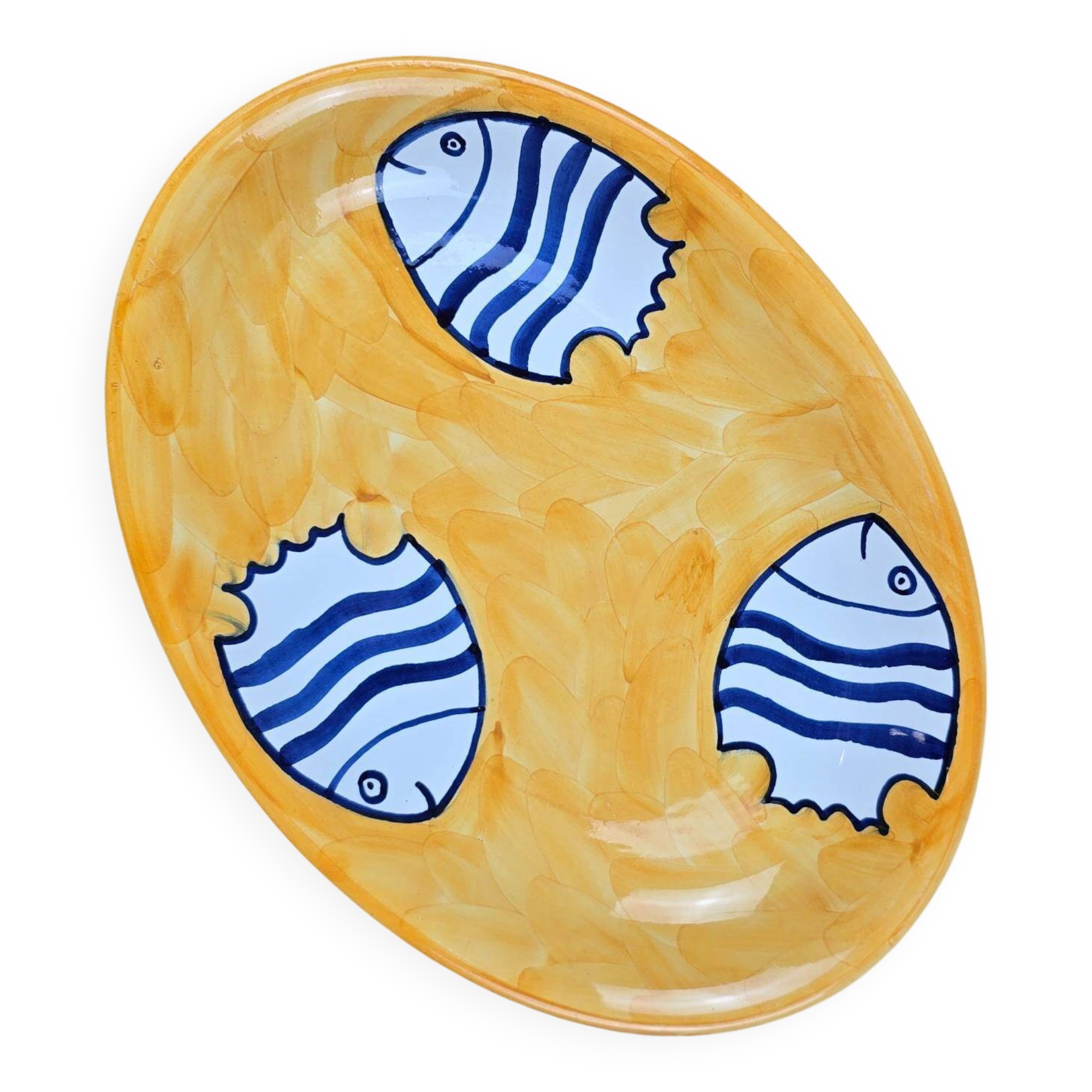 Oval dish decorated with hand-painted blue fish, Mediterranean style
