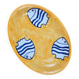Oval dish decorated with hand-painted blue fish, Mediterranean style