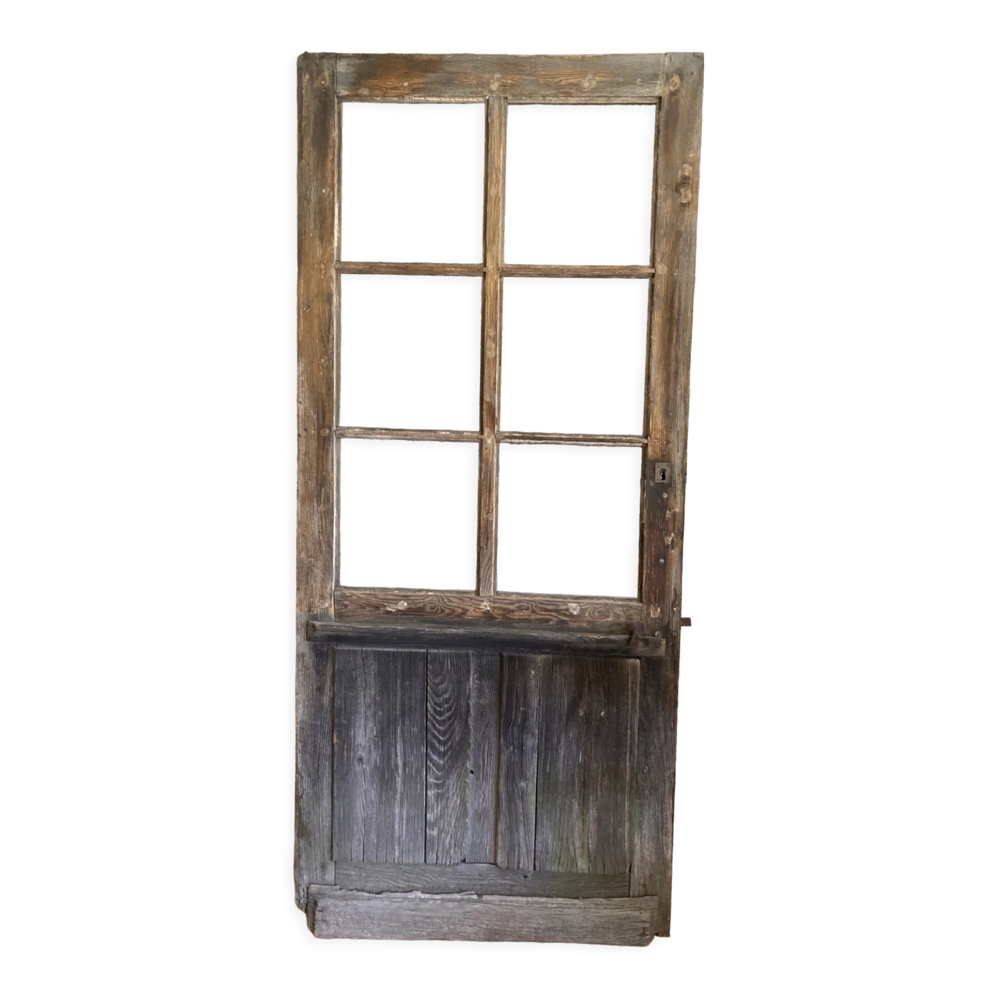 Old glazed wooden door patinated