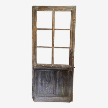 Porte ancienne vitrée en bois patiné