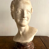 Plaster bust on marble stand