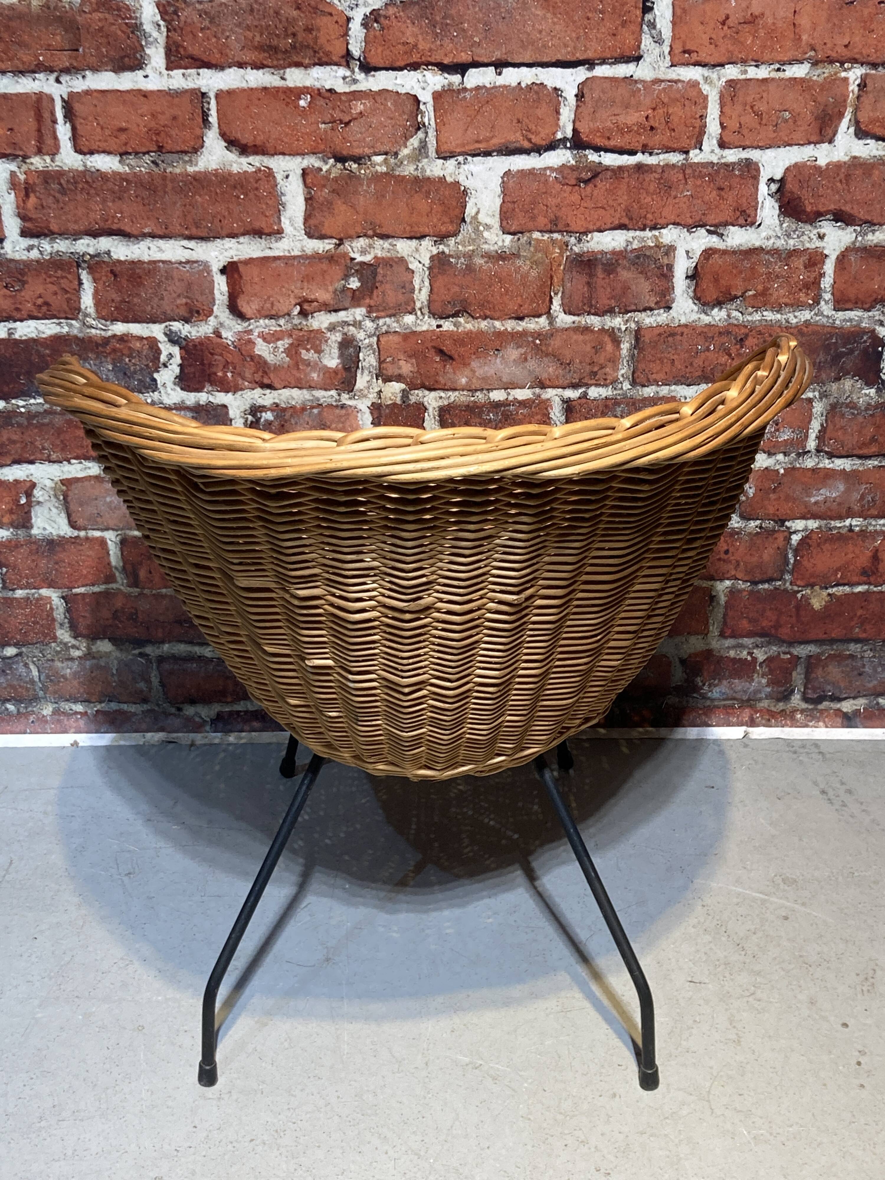 Wicker and metal armchair
