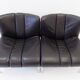 Eurochair set of 2 black leather lounge chairs by Girsberger