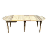 Table à manger ronde extensible à volets décapée en chêne brut 4 rallonges