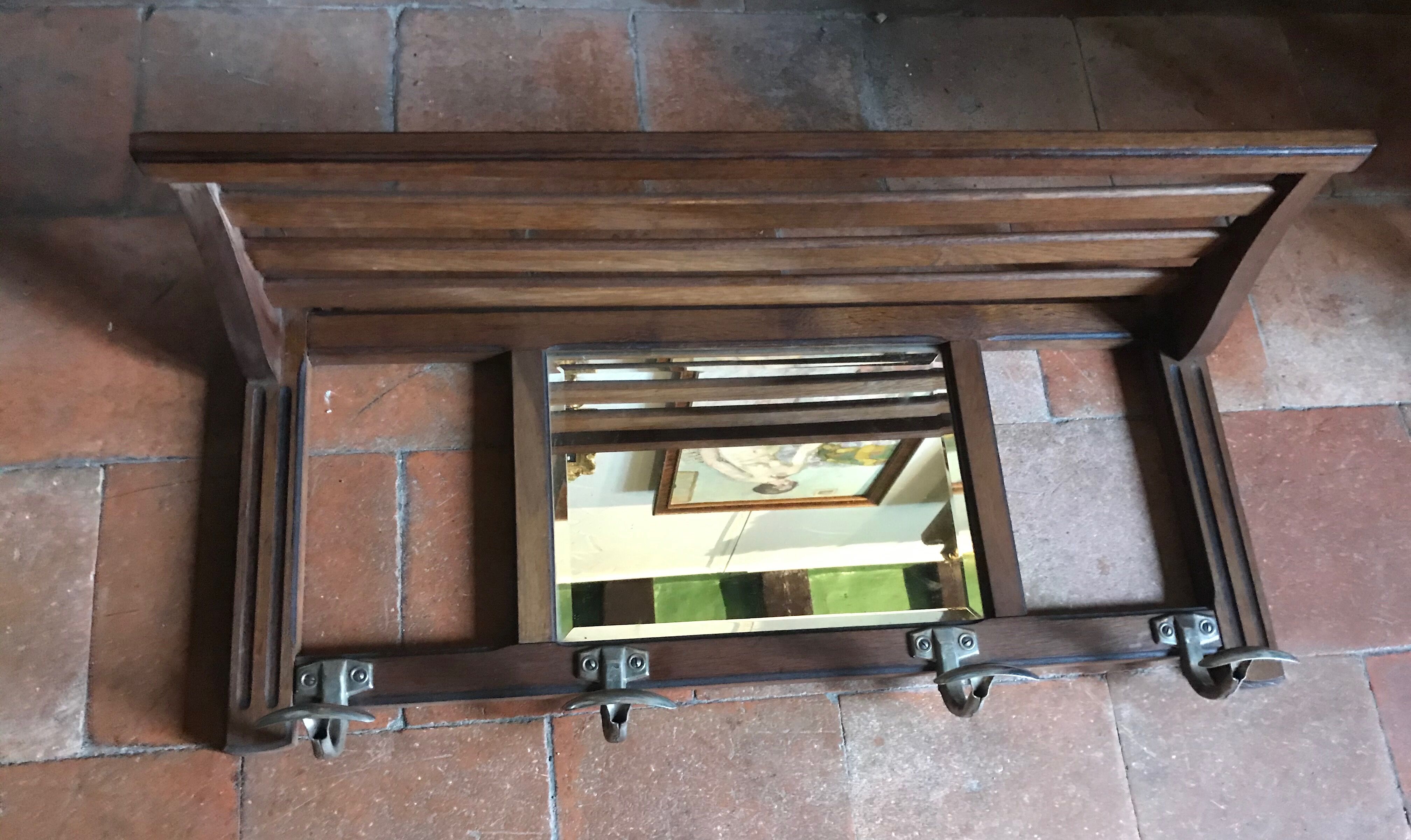 Coat hanger with mirror