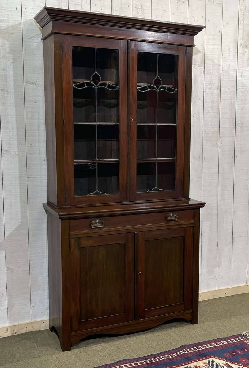 Early 20th century English two-section mahogany bookcase