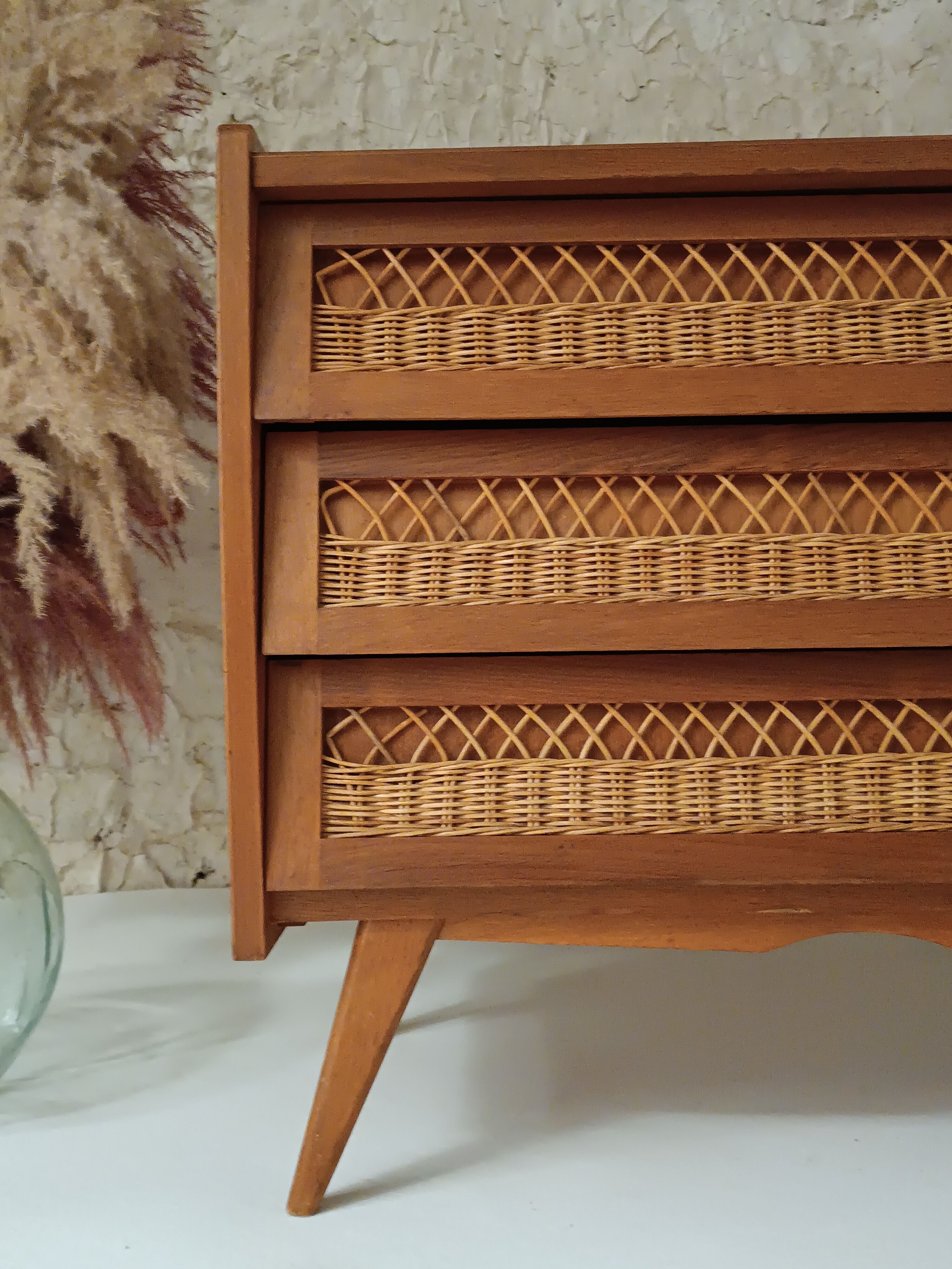 Vintage wooden and rattan chest of drawers in the 60s