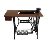 Singer's sewing machine foot console