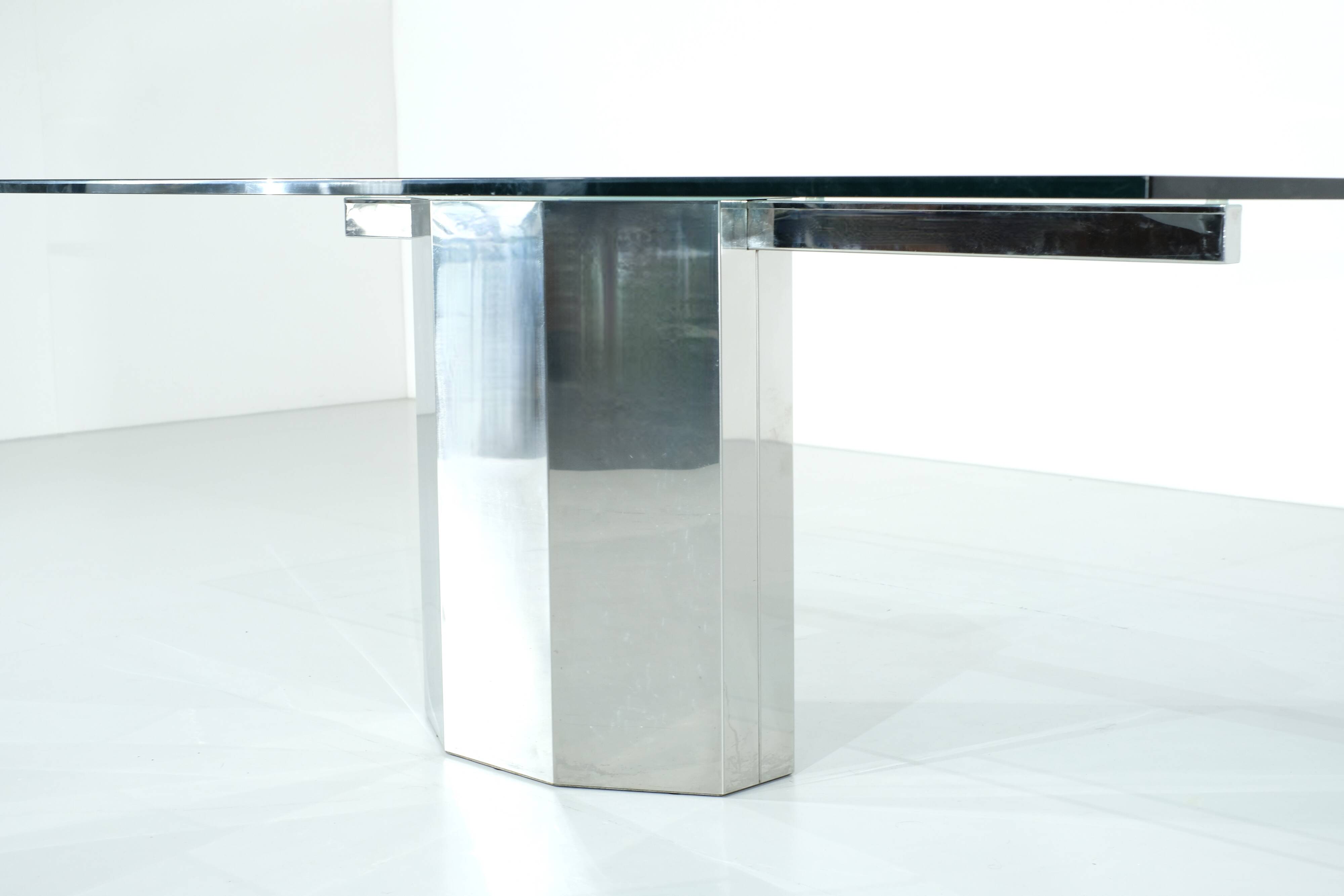 Glass table on chrome base, Italy - 1970s