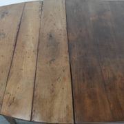 Rare antique oval French extendable dining table made of fruitwood
