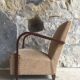 Art Deco armchair - curved wooden armrests - wool coating - mid-twentieth century