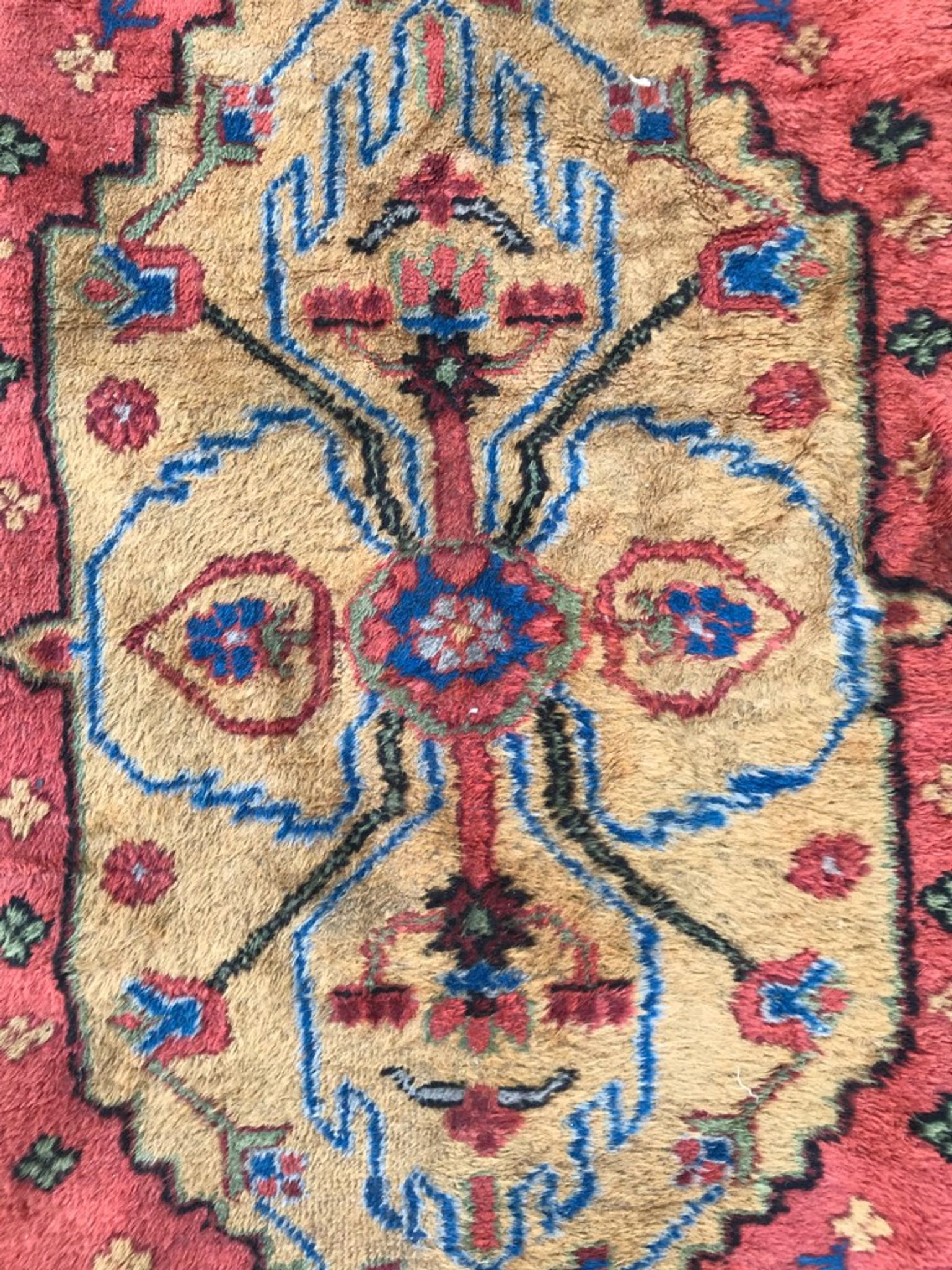 Old sinkiang oriental rug handmade 68 x 139 cm