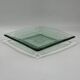 Square sculptural glass plate, textured wavy finish.